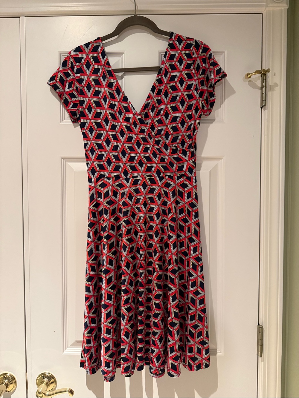 Geometric Print V‑Neck Fit & Flare Dress in Reddish-Orange and Navy